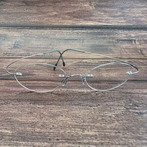 Silhouette 7534 Rimless Eyeglasses Silver Titanium Oval Frames 50-19-150